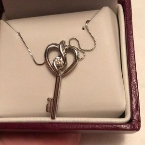 Necklace with diamond in center